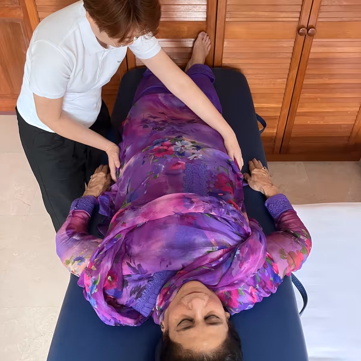 Student performing 12 hand positions reiki at the Reiki 1 workshop on 23 Aug 2025